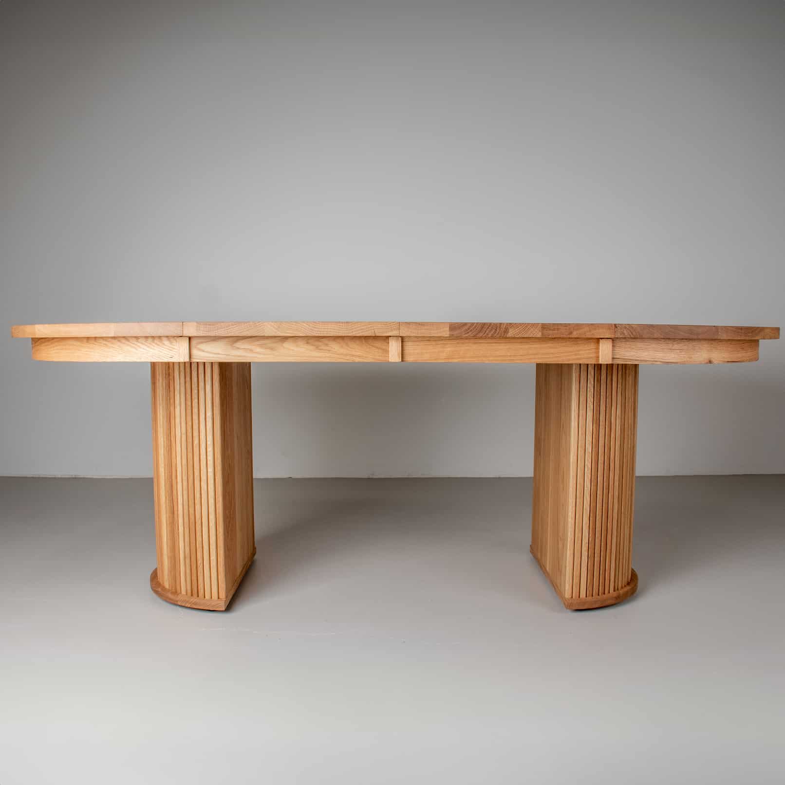 Yoho Round Extendable Pedestal Table - Image 6